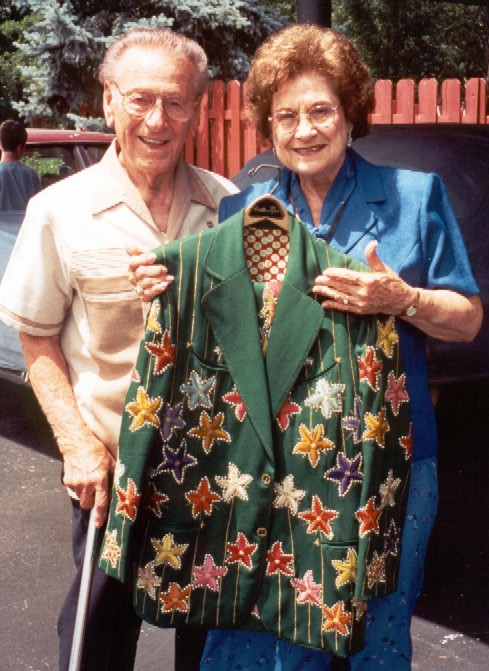 Johnny Wright and Kitty Wells with one of Johnny's Nudie Suits